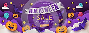 Halloween Sale Promotion banner with cutest pumpkins, bats and ghosts in night clouds on violet background photo