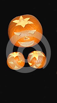 Halloween sculptured pumpkin lit candles. decoration