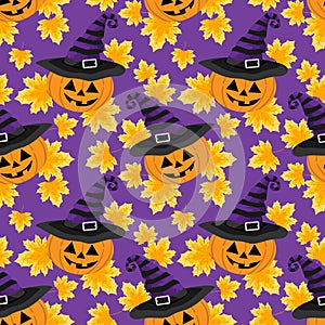 Halloween seamless pattern with cute Halloween pumpkin with witches hat and autumn leaves.