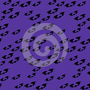 Halloween seamless pattern with silhouette bat on violet background.