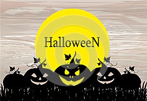 Halloween. Silhouette of a pumpkins. Vector on wooden background