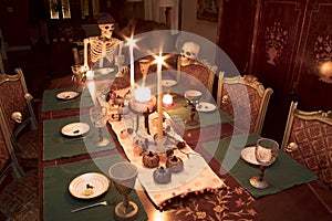 Halloween Skeleton Family Celebrating a Holiday Dinner