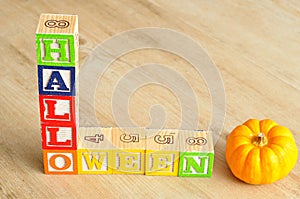 Halloween spelled with alphabet blocks