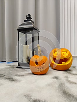 Halloween spooks. Carved jack-o'-lantern orange pumpkins