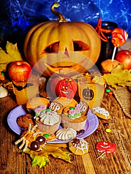 Halloween table with trick or treat Jack OLanten pumpkin.