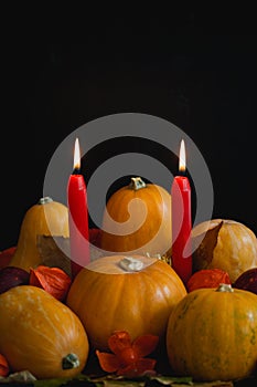 Halloween thanksgiving autumn composition pumpkins apples burning candles