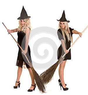 Halloween witch blond in black dress, hat, broom.