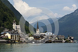 Hallstadtt colorful village at the foot of Alps mountains interface the lake