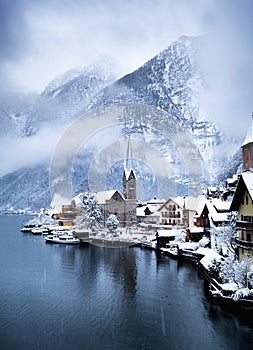 Hallstat village in the Austria. Beautiful village in the mountain valley near lake. Mountains landscape and old town.