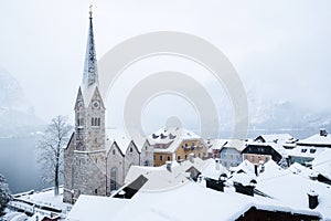 Hallstat village in Austria. Beautiful village in mountain valley near lake. Mountains landscape and old town.