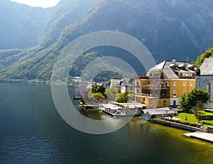 Hallstatt, Austria. Aerial view of the beautiful town from a flying drone over the lake in summer season