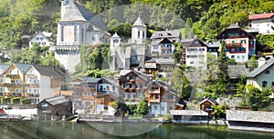 Hallstatt, Austria. Aerial view of the beautiful town from a flying drone over the lake in summer season