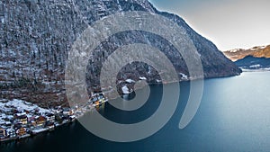 Hallstatt Austria, Aerial view on houses in small alpine village, mountains and lake winter time