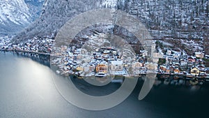 Hallstatt Austria, Aerial view on houses in small alpine village, mountains and lake winter time