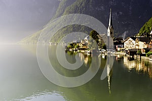 Hallstatt at Morning with Sunlight and Reflection on the Lake, Austria, Europe