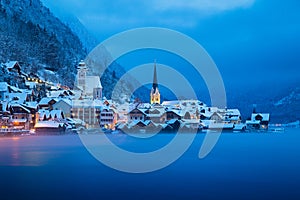 Hallstatt in mystic twilight in winter, Salzkammergut, Austria