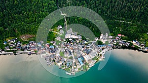 Hallstatt old town and Hallstatter See lake in Upper Austria, mountains and forest background