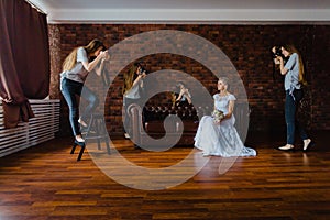 Hallucination of a bride with four photographers