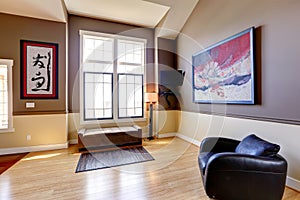 Hallway with brown and ivory wall trim