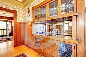 Hallway interior with wooden plank trim. View of carpet stairs.