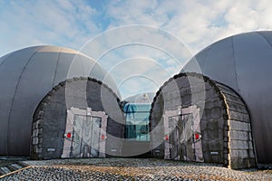 Hallway with a magic door in a spaceship. Metal security doors to a building from a game or fairy tale. Futuristic design