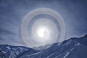 Halo efect in the mountain, witnter snow in Himalayas. Landscape on Hemis NP, Kashmir in India. Halo is a ring or light that