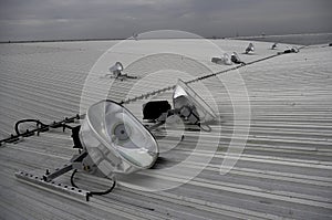 Halogen spotlights on metal roof