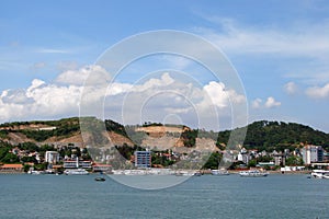 Halong Bay Coast of the South China Sea. Vietnam. View of the seaside and the symbols of Eastern religions.