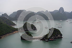 Halong Bay in mystical clouds. Mystical atmoshpere in the world famous halong bay.