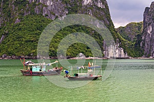 Halong bay traditional fishing boats, UNESCO world natural heritage, Vietnam