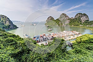 HALONG BAY, VIETNAM - CIRCA AUGUST 2015: Cruise ships in Dau Go island bay, Halong Bay, Vietnam