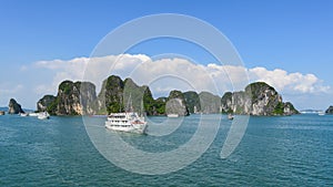 Halong bay in Vietnam, South Asia, and Tourist Junks. Panoramic view. Travel destination and natural background