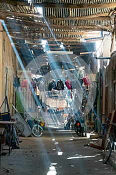 Halos of light in an alley of the market of the city of Merzouga. Morocco