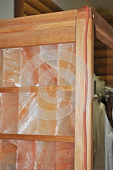 Halotherapy room construction. A close-up of a salt room, salt chamber wall built from pink Himalayan salt bricks