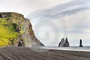 Halsanefshellir and rocks of Reynisdrangar (by legend, the evil trolls) can be found on the beach by Mount Reynisfjall