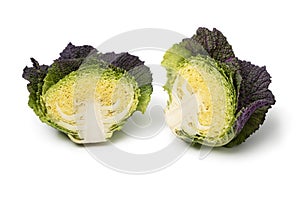 Halved fresh raw Pontoise cabbage isolated on white background