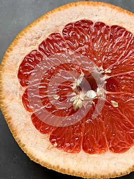 halved grapefruit, juicy fruit, fruit with a bitter taste, citrus fruit, juicy fruit, peel group