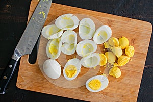 Halved Hard-Boiled Eggs on a Cutting Board