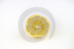 Halved lemon on white background