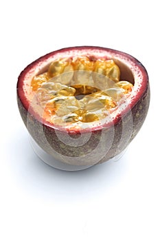 Halved passion fruit on white background