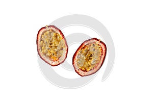 Halved passion fruit on white background. Design element. Tropical fruit. Delicious juicy pulp for preparing desserts and