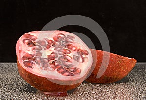 Halved pomegranate fruit