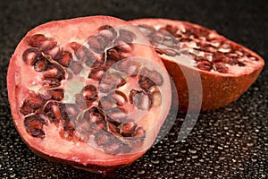 Halved pomegranate fruit