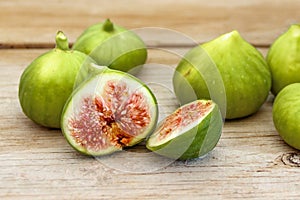 Halved, ripe figs in vintage/retro kitchen setting