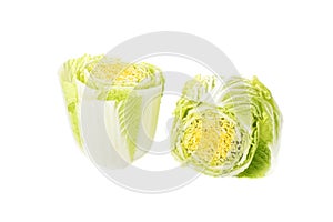 Halved salad cabbage or petsai isolated on a white background