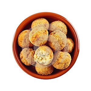 Halved and whole fried bacalao croquettes photo