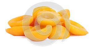 Halves of canned peaches isolated on white