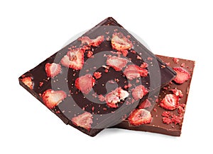 Halves of chocolate bars with freeze dried strawberries on white background