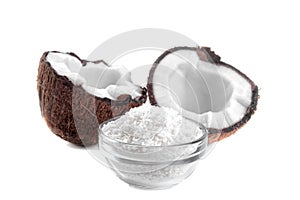 Halves of coconut with coconut shaving isolat