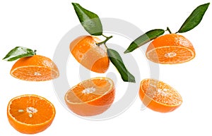 Halves of tangerines in air.